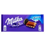 Шоколад молочний Milka з кремовою начинкой та кусочками печива Орео 100г.